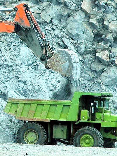Filling large ore mover
